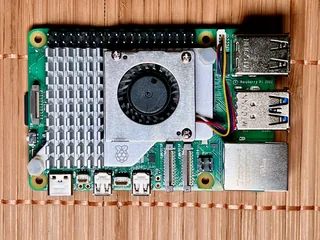 Raspberry Pi 5 single-board computer with the official active cooler fitted